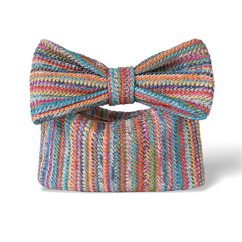 Colorful striped bow bag on a white background