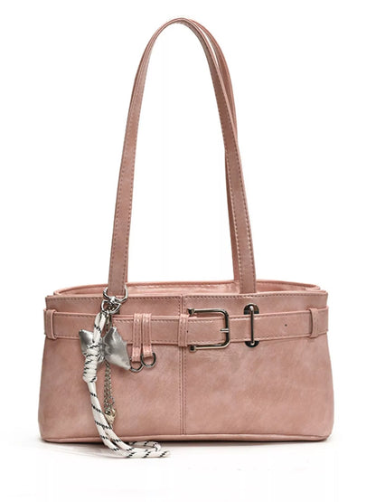 Pink handbag with a silver chain detail on a white background