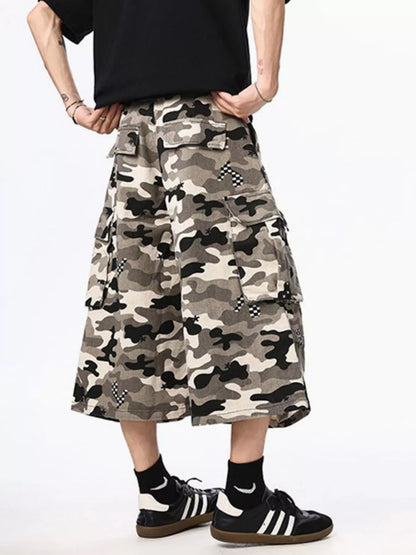 Person wearing a camouflage skirt with a plain background