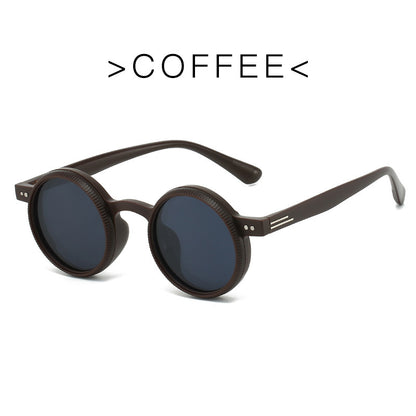 Round sunglasses with dark lenses on a white background, labeled 'COFFEE'.
