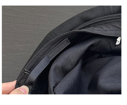 black material on gray background 