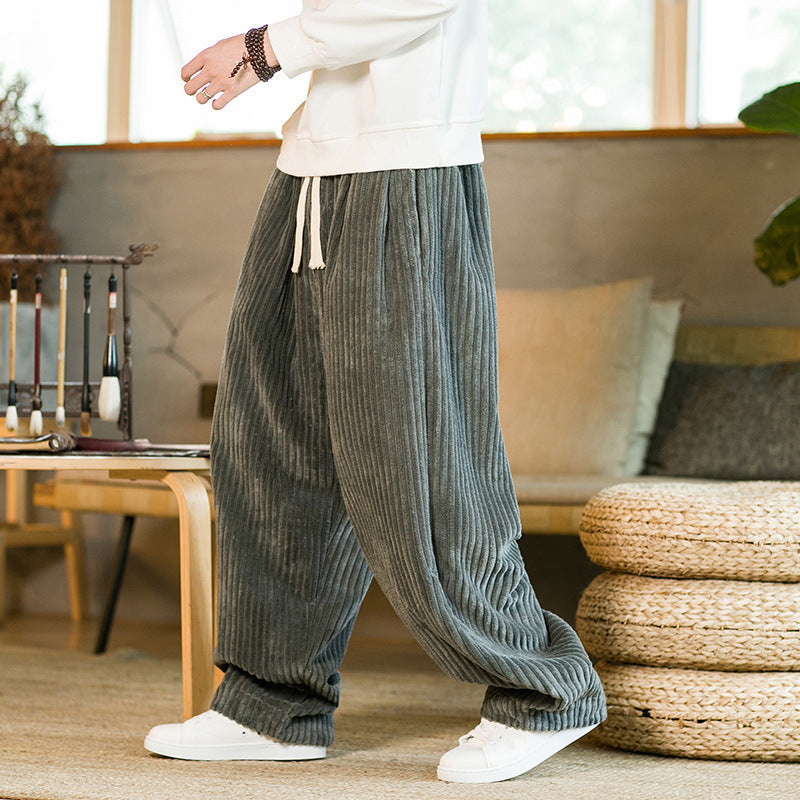 Person wearing corduroy pants in a home setting