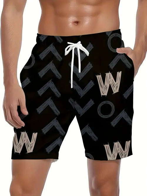 Black swim shorts with white lettering on a white background