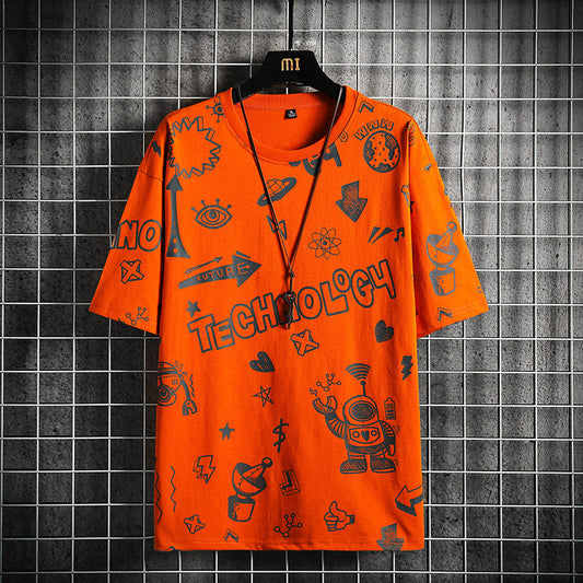 Orange t-shirt with black graphics and text on a hanger against a tiled wall.