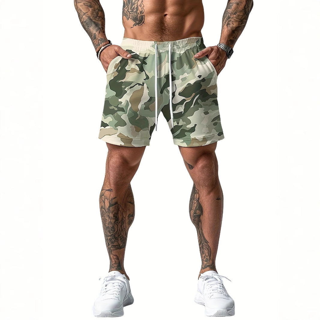Person wearing camouflage shorts on a white background