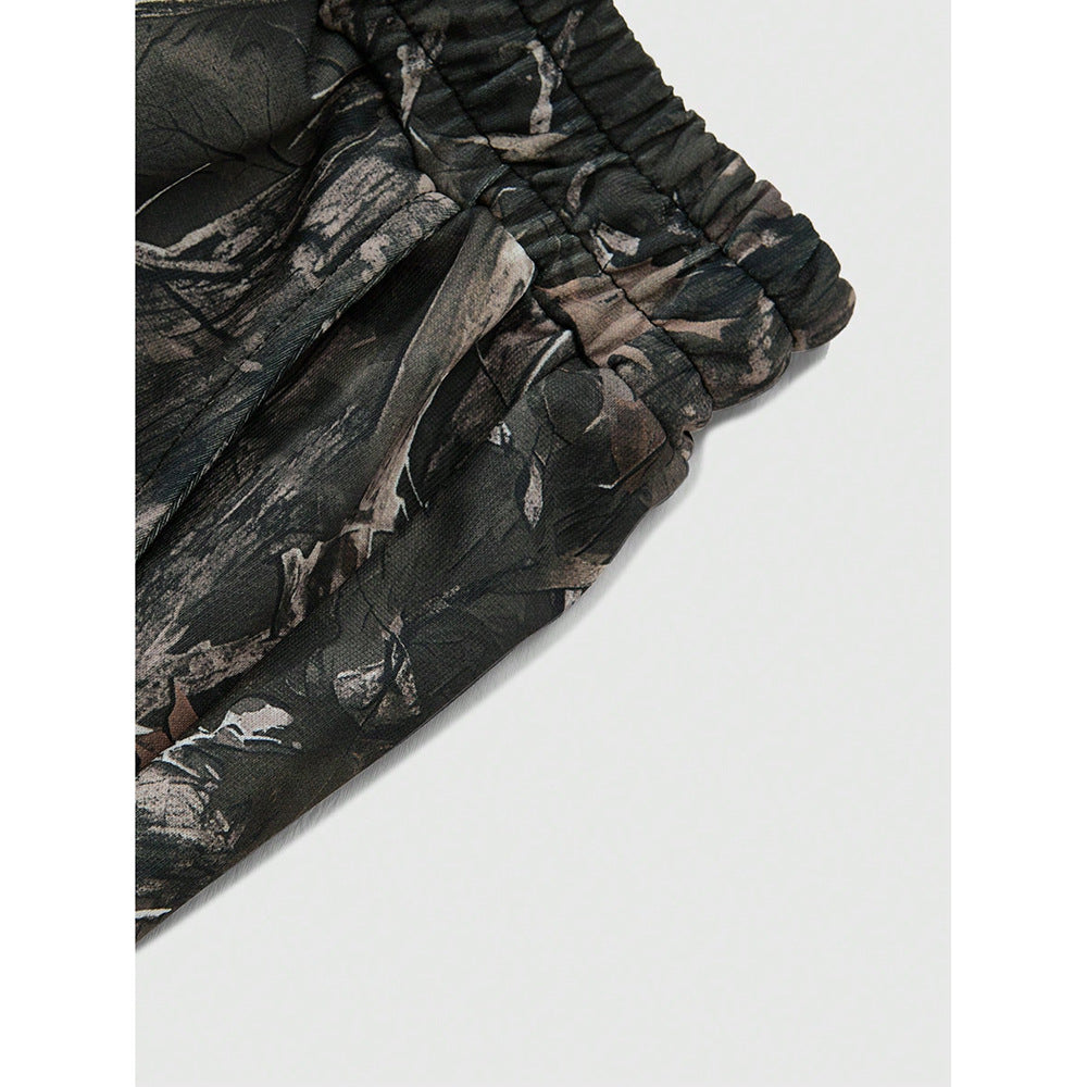 Camouflage print elastic band against a white background.