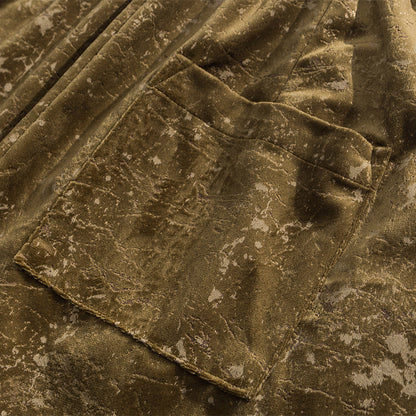 Close-up of brown textured fabric with folds