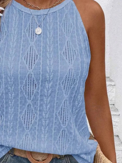 Light blue sleeveless top worn by a person with a neutral background