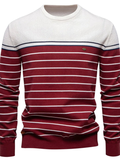 Maroon and white striped sweater on a white background