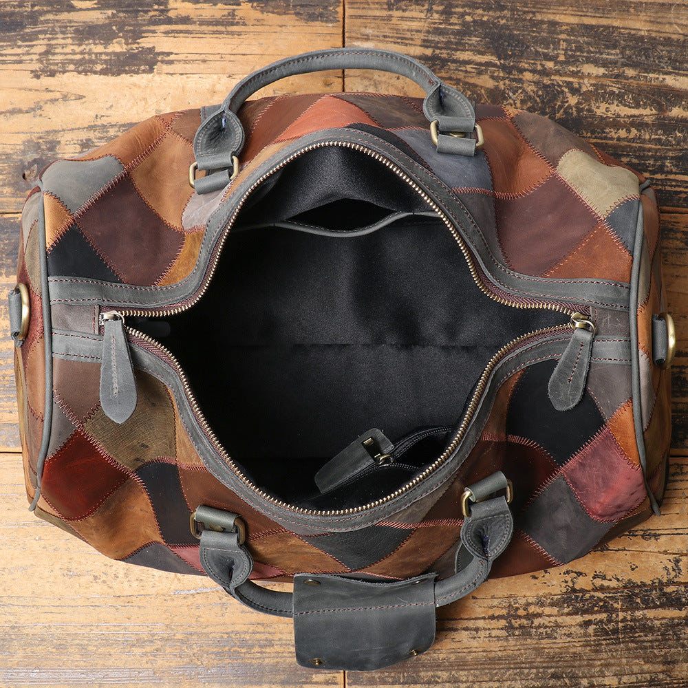 Patchwork duffel bag with open top on a wooden surface