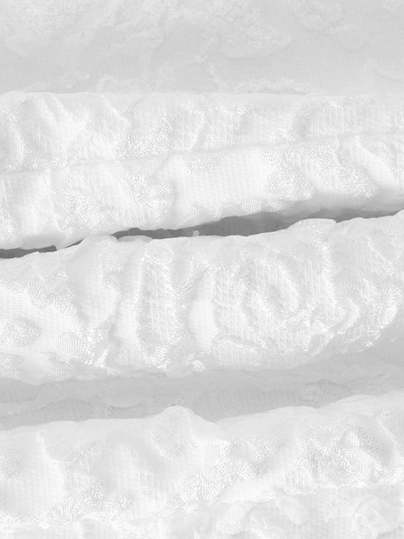 Close-up of snow with visible texture and patterns