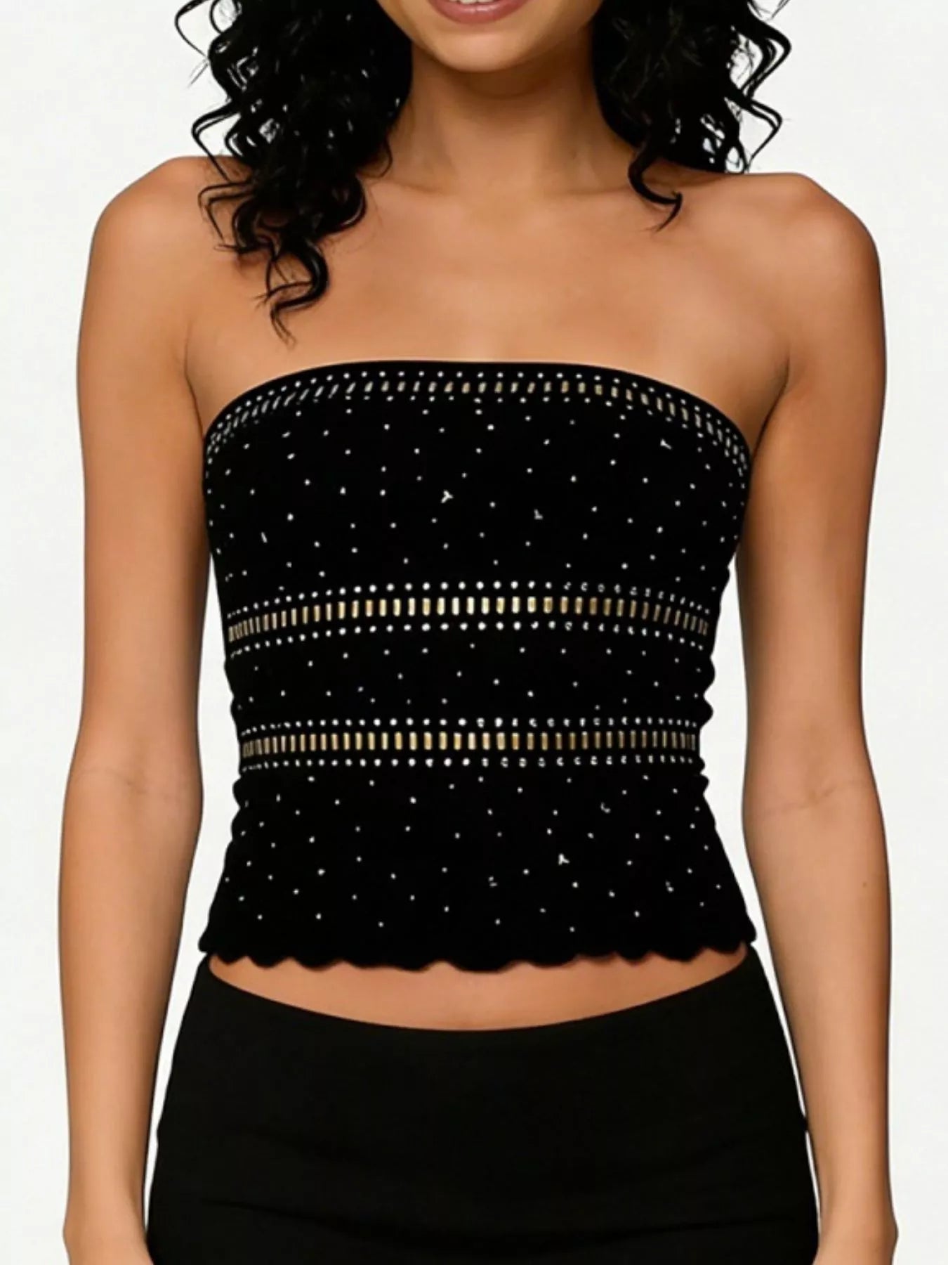 Black strapless top with white embellishments on a white background