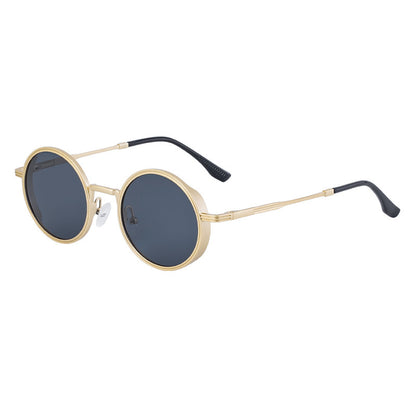 Round sunglasses with gold frame and black lenses on a white background