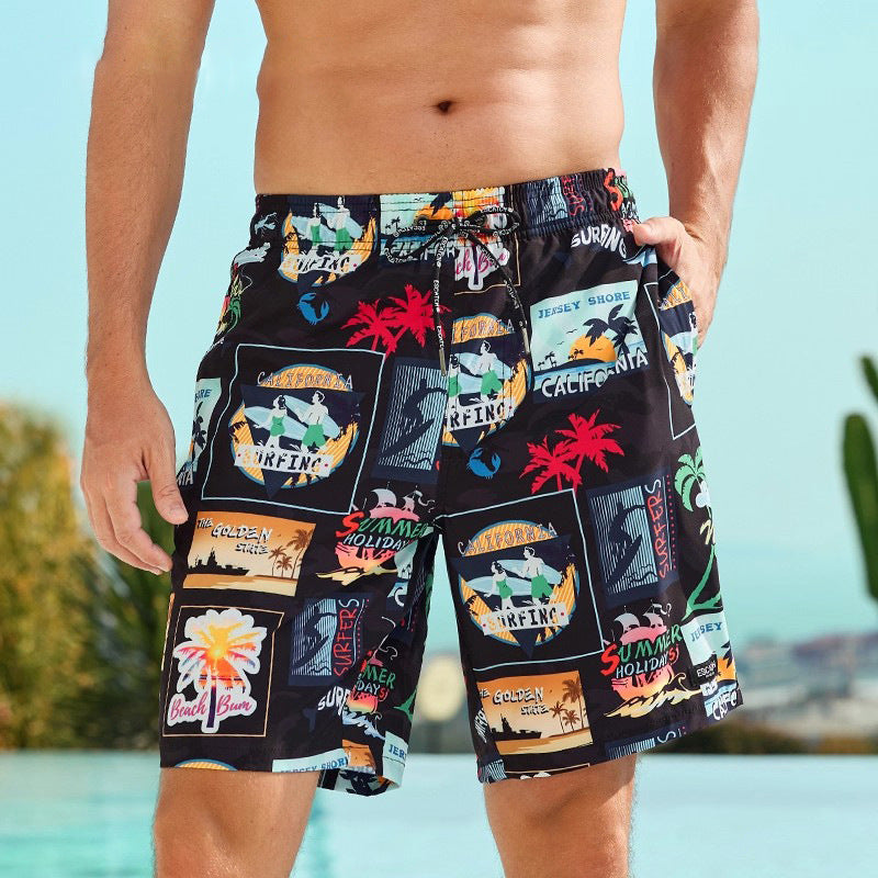 Person wearing colorful patterned shorts with a clear blue sky background
