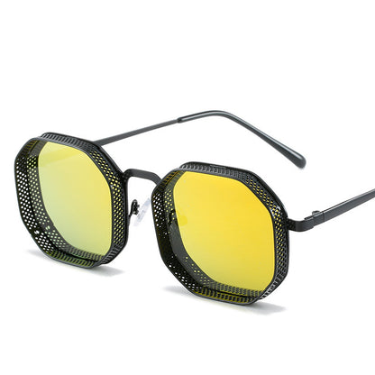 Sunglasses with yellow lenses and black metal frame on a white background