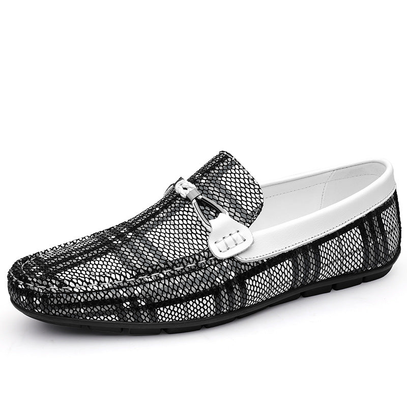 Black pattern loafer with white sole on a white background