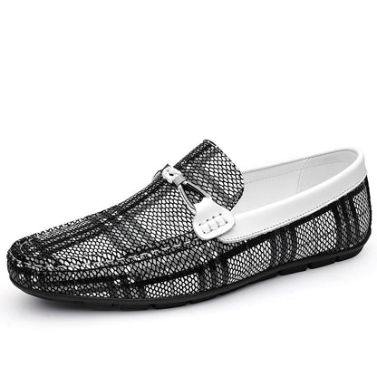 Black pattern loafer with white sole on a white background