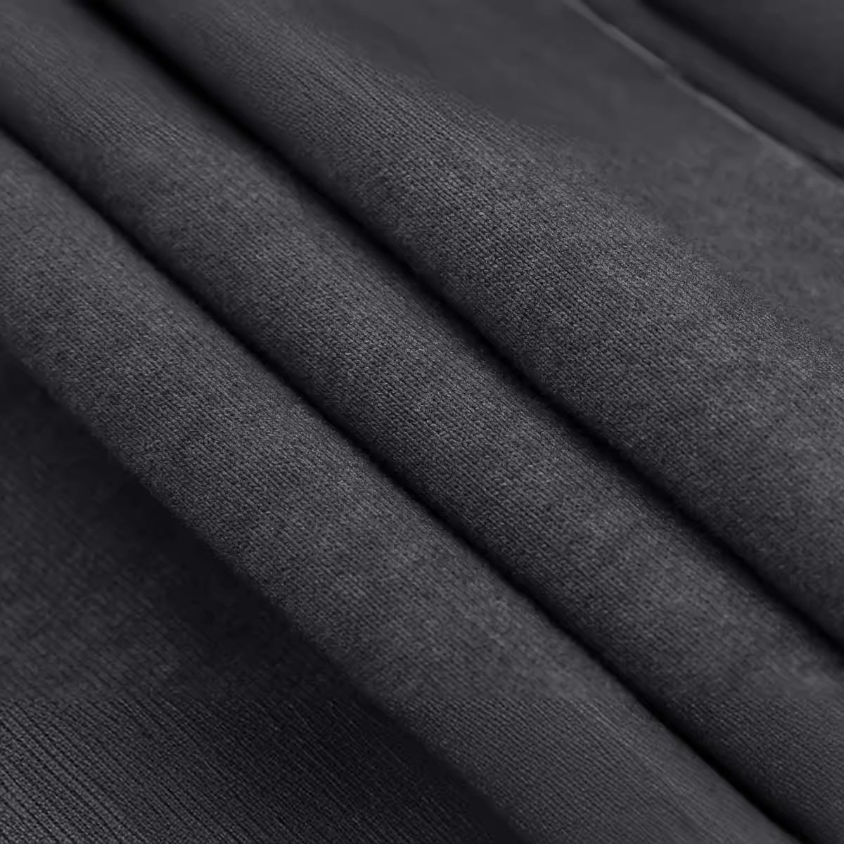 Close-up of dark gray fabric with visible texture