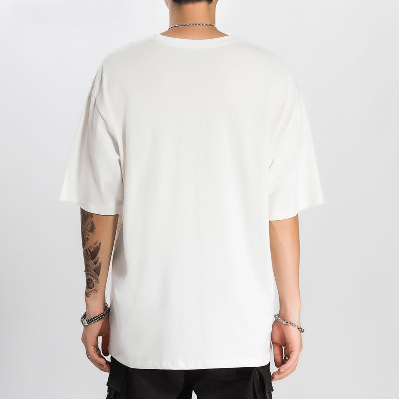 person wearing a white t-shirt on a white background.