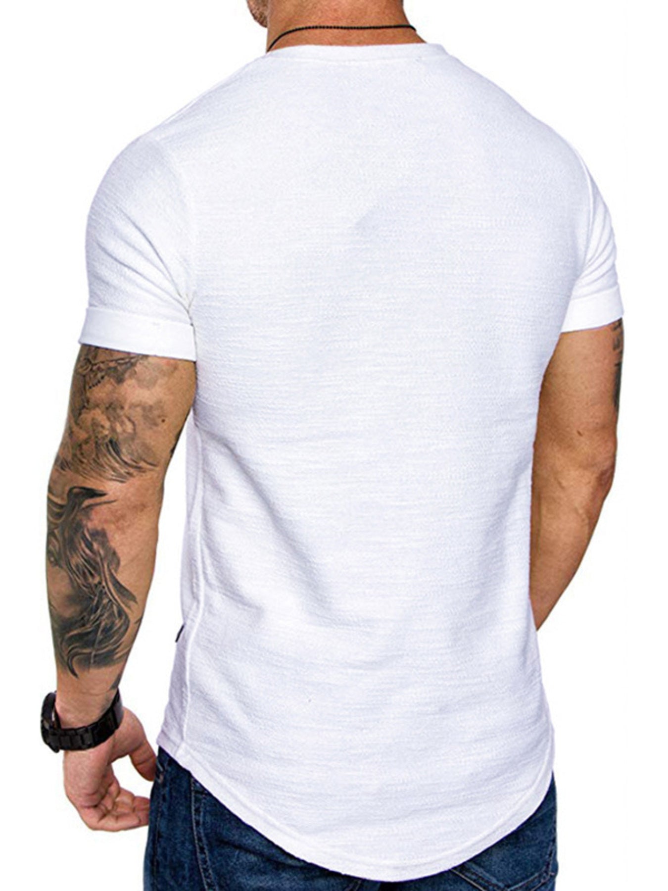 Man wearing a plain white t-shirt on a white background
