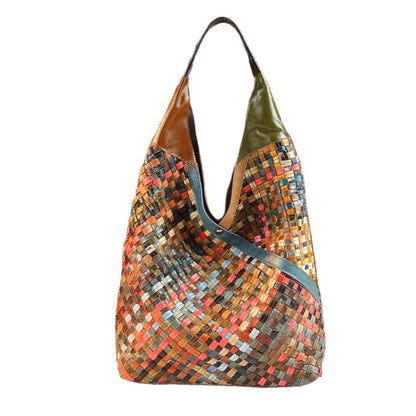 Multicolored woven handbag on a white background