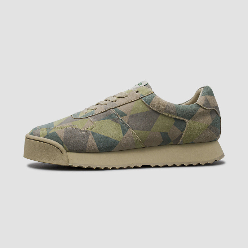 Geo Metric patterned sneaker on a plain beige background.