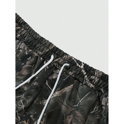 Camouflage print elastic band against a white background.