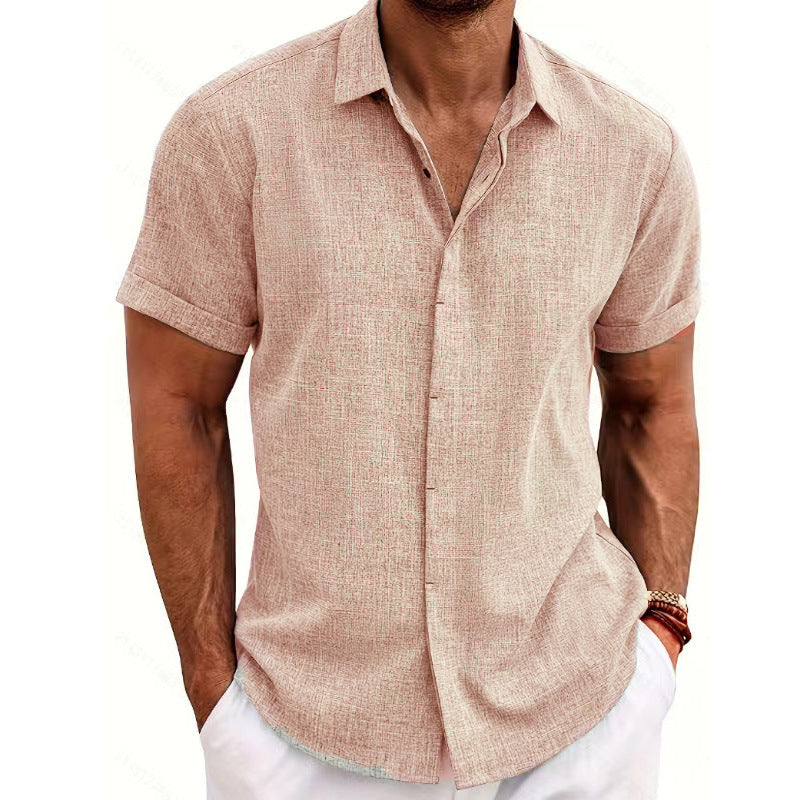 Man wearing a beige short-sleeve shirt on a white background