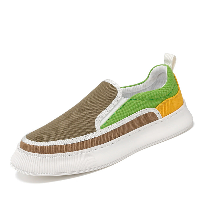 Multicolored slip-on sneaker with brown, green, and yellow sections on a white background