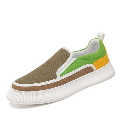 Multicolored slip-on sneaker with brown, green, and yellow sections on a white background