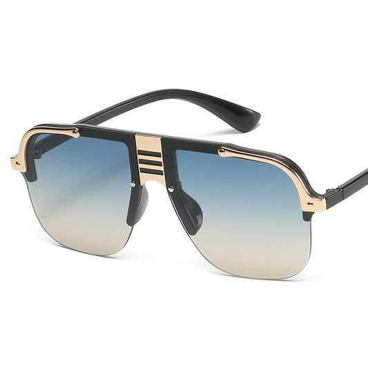 Sunglasses with gold and black frame on a white background
