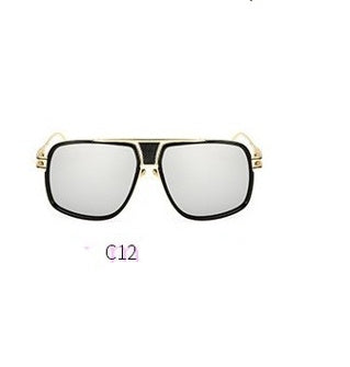 Sunglasses with gold frame and black lenses on a white background