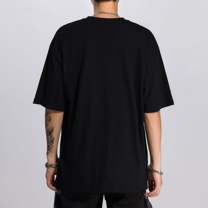 person wearing a black tshirt on a white background.