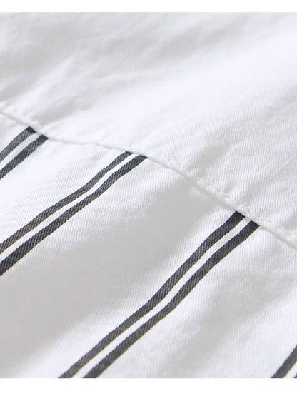 Close-up of a white fabric with black stripes