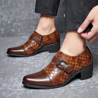 Brown patterned shoes being worn on a gray surface