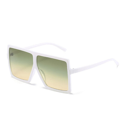 Sunglasses with gradient green lenses and white frame on a white background