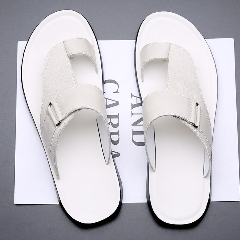 White sandals on a magazine with visible text
