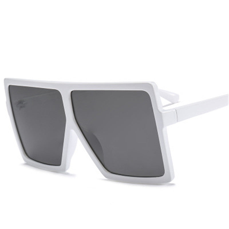 White sunglasses with dark lenses on a white background