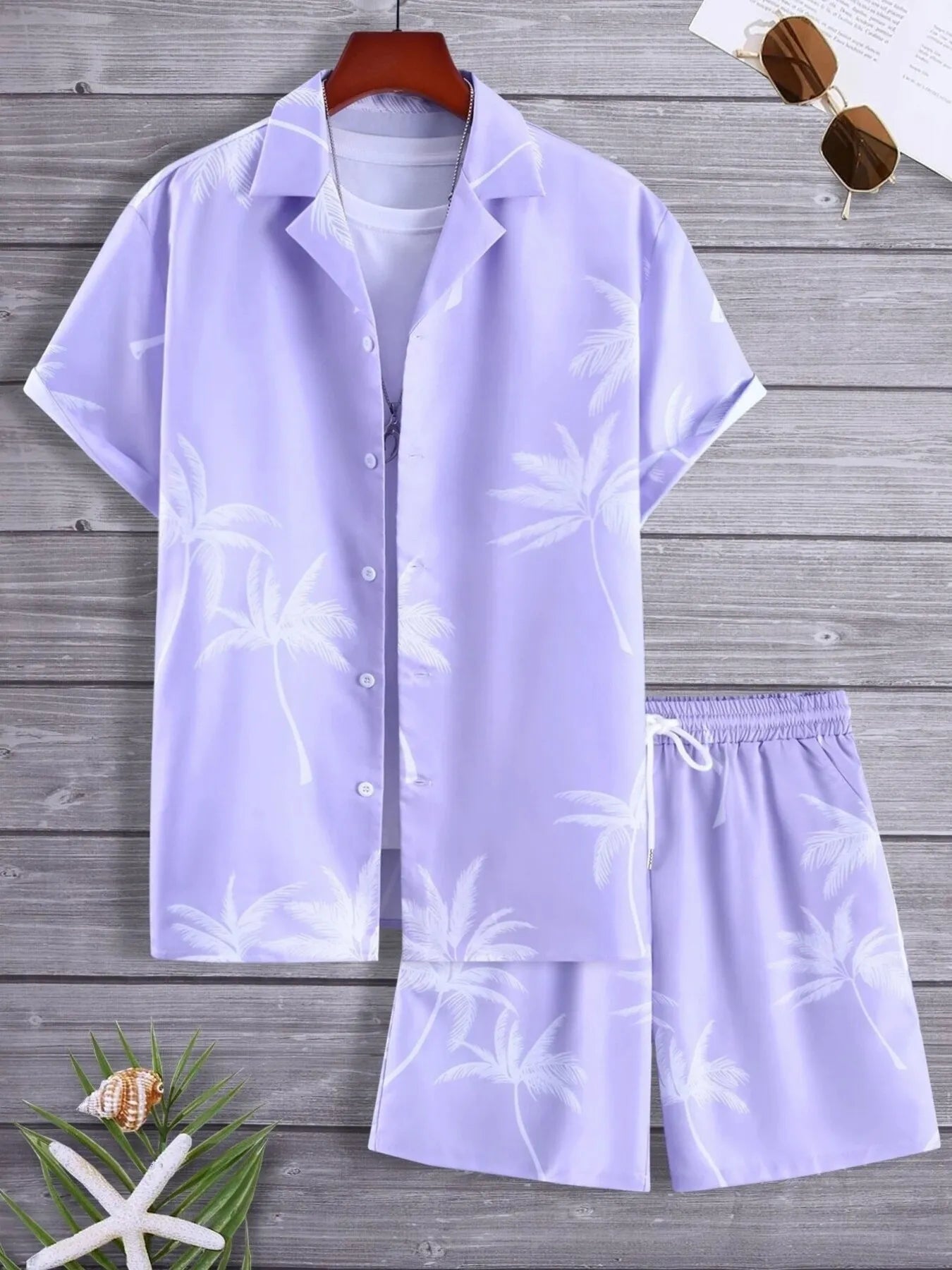 Light purple pajama set with white floral patterns on a wooden background