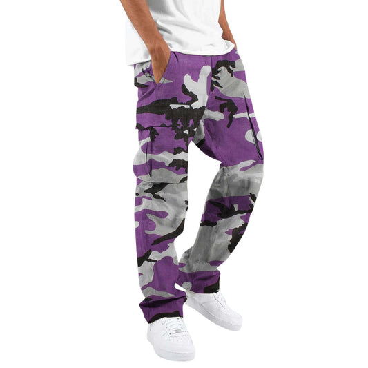 Purple and gray camouflage pants worn by a person on a white background