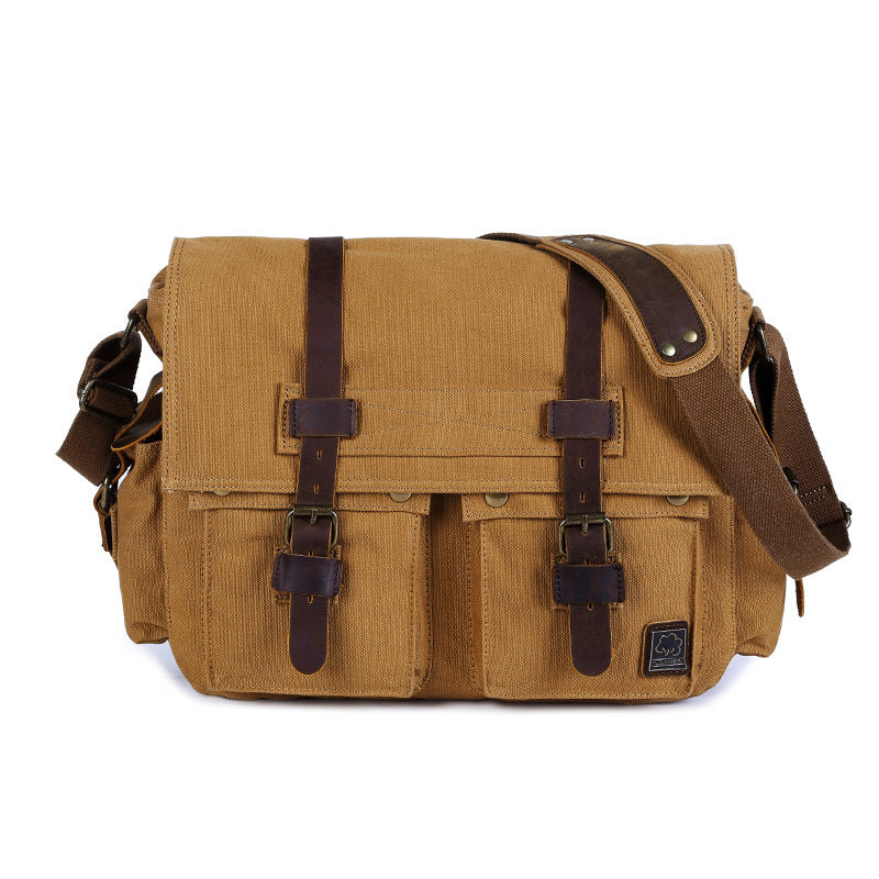 Brown leather and fabric bag with straps on a white background
