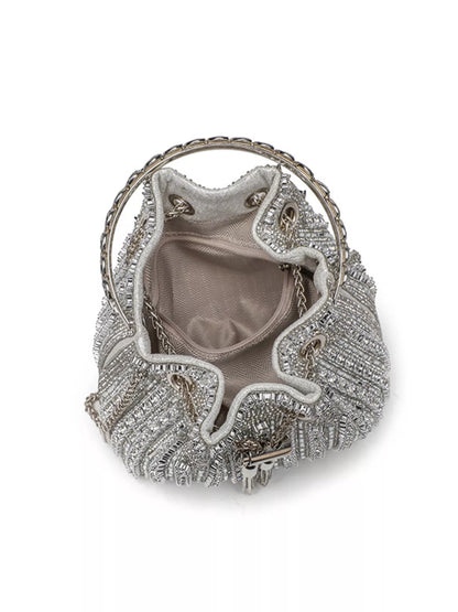 Silver beaded handbag on a white background