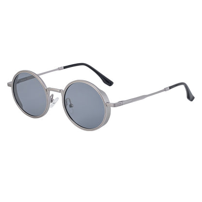 Round sunglasses with metallic frame and dark lenses on a white background
