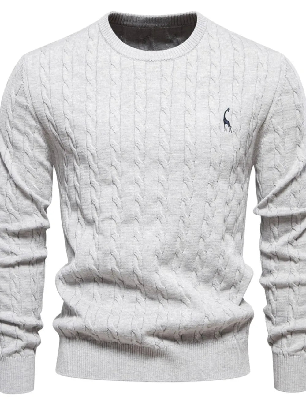 White cable knit sweater with a small logo on a white background