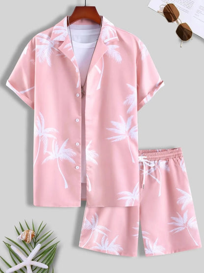 Pink pajama set with white floral pattern on a hanger against a light gray background.