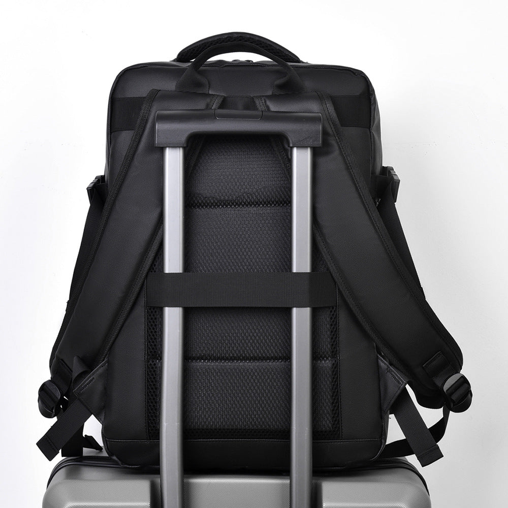 Black backpack with wheels on a white background