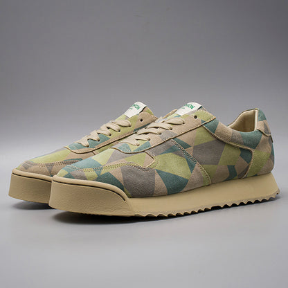Geo patterned sneakers on a gray background