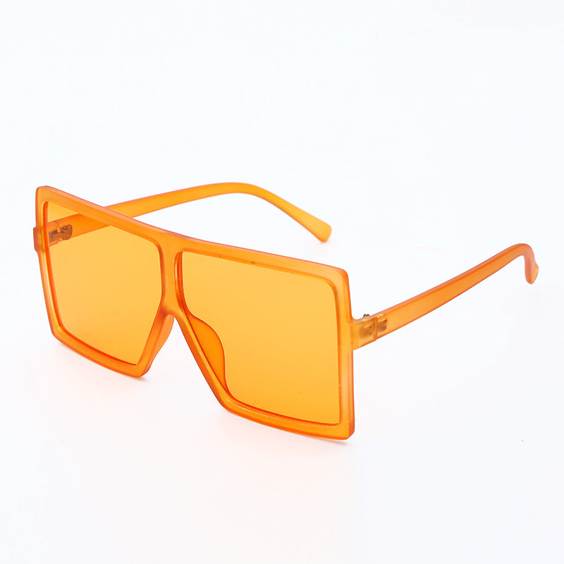 Orange sunglasses on a white background
