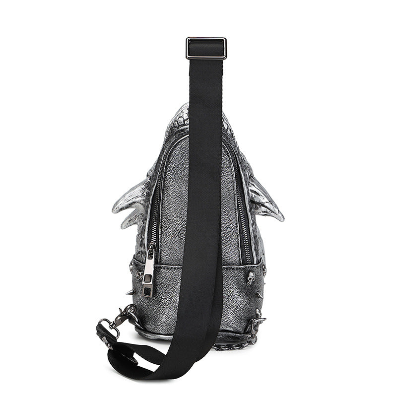 Silver backpack with black strap on a white background