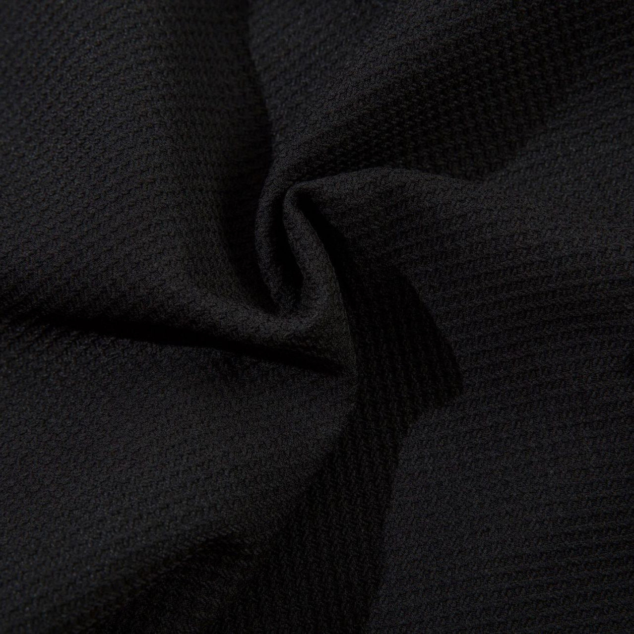 Close-up of dark textured fabric